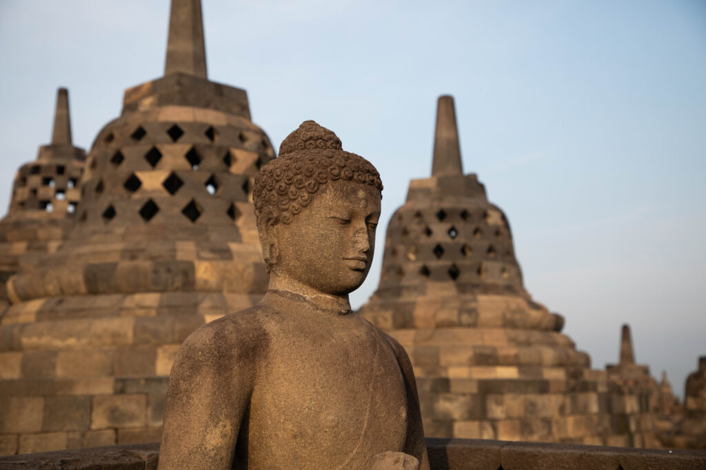 Stupas and Buddha at Borobudur.