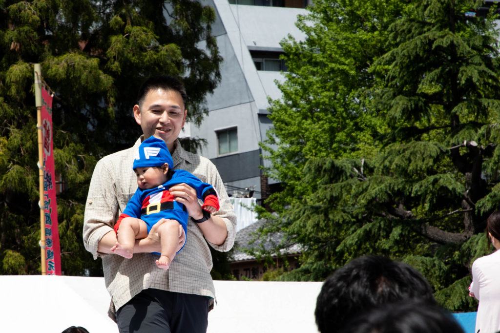 Proud father with baby before the sumo cry fest begins.