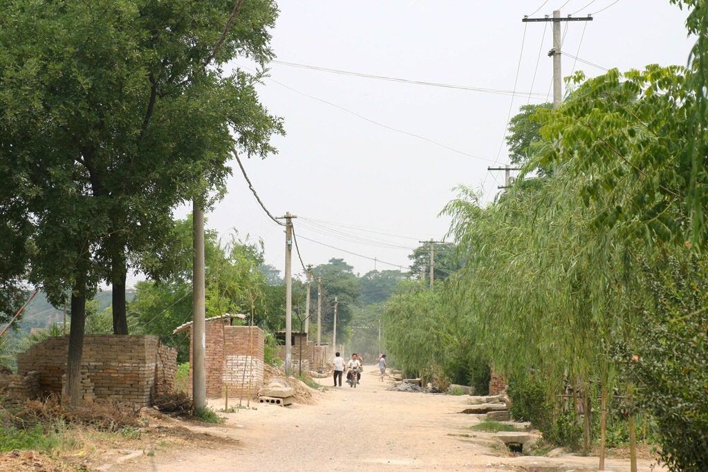 Some of the places to visit in Xian are a bit out of the way. We hired a driver who took us on backroads just like this one. 