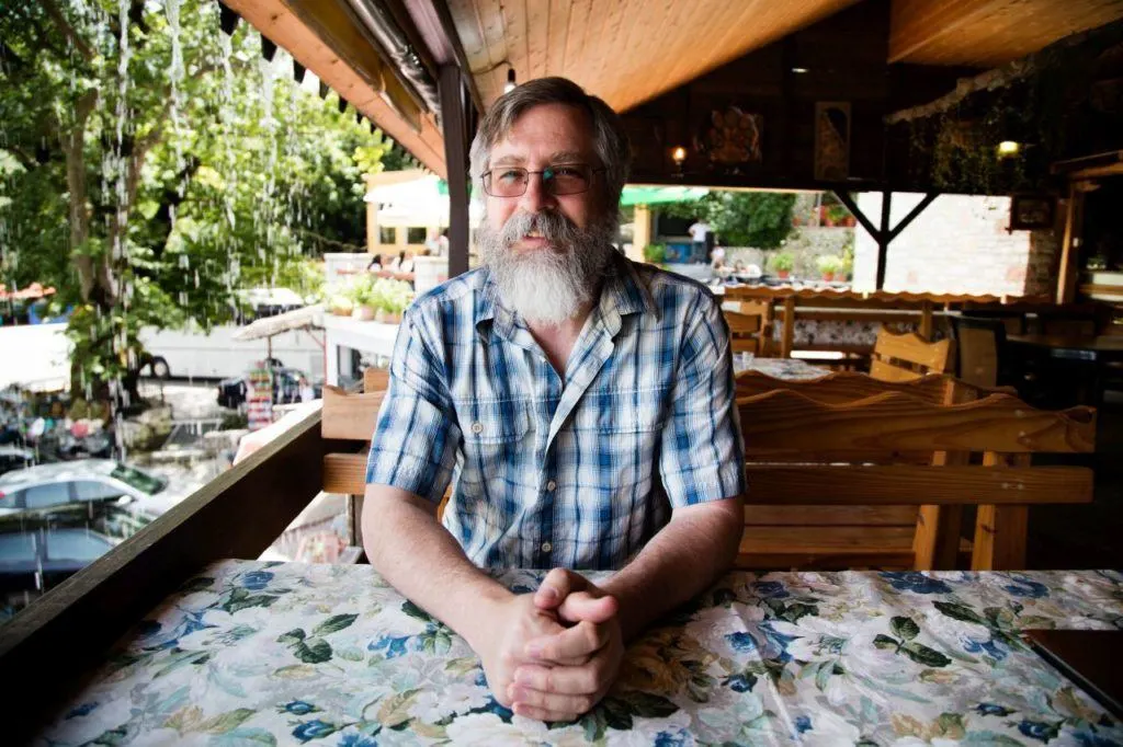 Jim enjoying the refreshing breeze as the waterfall topples over the restaurant.