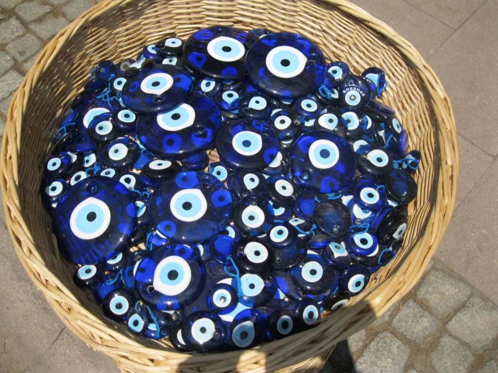 A basket of evil eye charms, which in Turkey, are called Nazar Boncuk meaning eye bead.