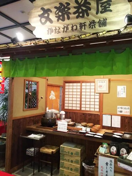 Buying a snack at the Japanese puppet theater.