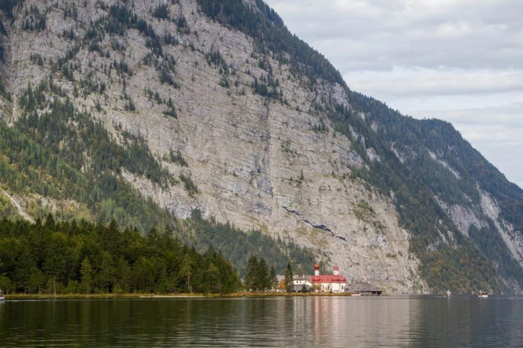 St. Bartholomew's Church on an alpine lake in Bavaria.