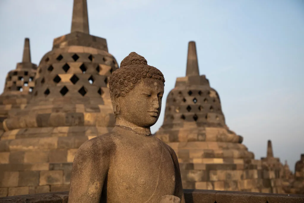 Stupas and Buddha at Borobudur.