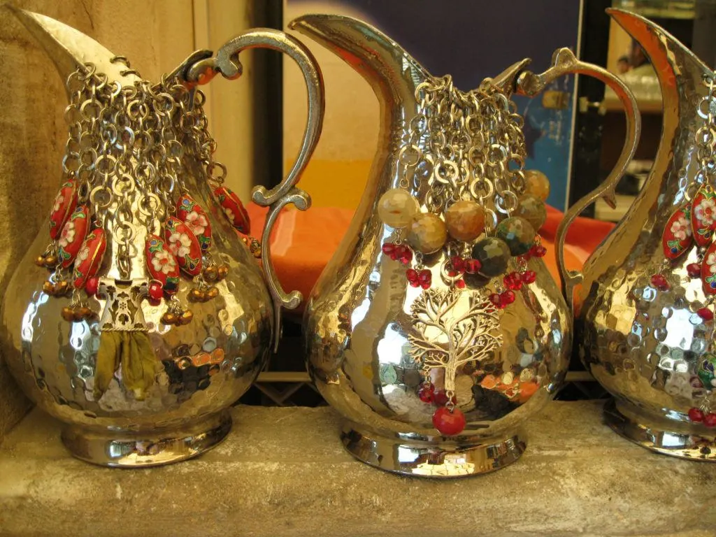 Beautiful polished and elaborately decorated copper water pitcher are perfect gifts from Turkey.