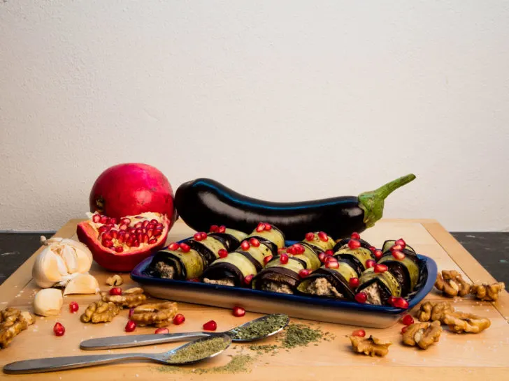 Our top 5 appetizer ideas, like this one with is Georgian eggplant rolls with walnuts and pomegranate seeds.