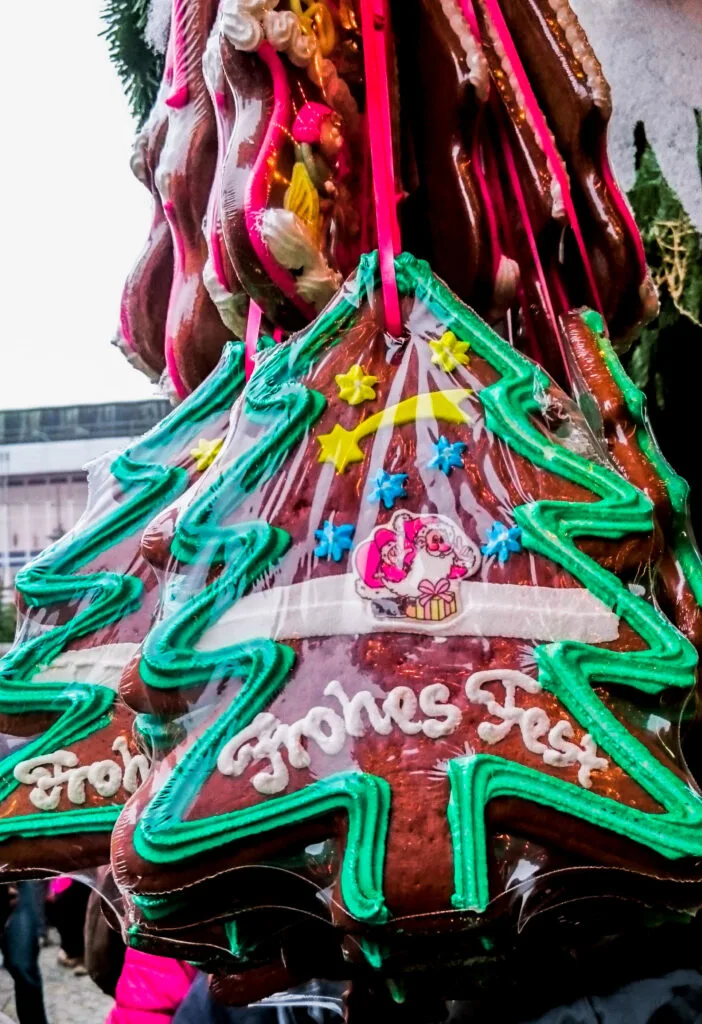 Gingerbread shapes with messages are a sign of being at a festival. In winter those festivals are Christmas Markets.
