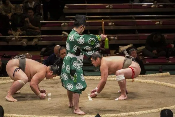 The referee starts the match.