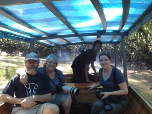 Taking a boat tour through the jungles of Brunei, bring your camera.
