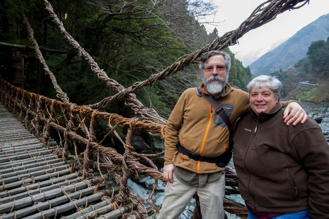 Jim and Corinne on a rope bridge in Japan.