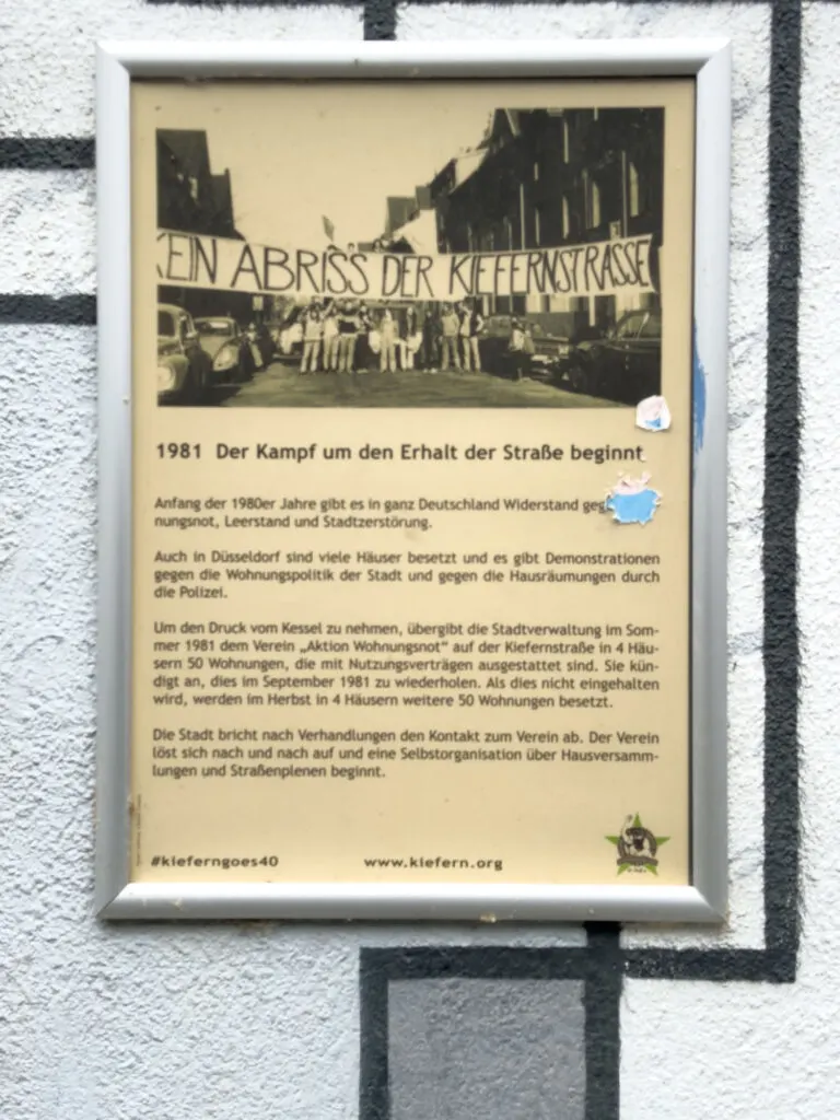 Information sign. Kiefernstrasse street art, Düsseldorf, Germany.