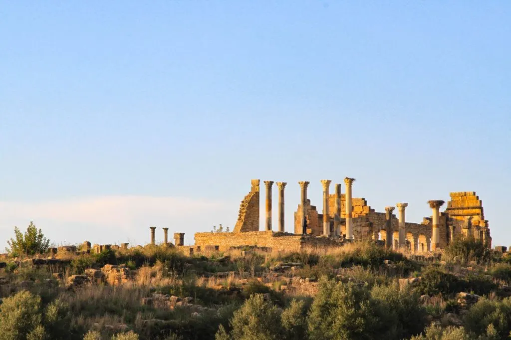 Looking up at the Roman Basilica ruins in Volubilis, Morocco, A UNESCO World Heritage Site.