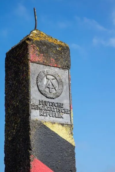 Signpost showing where the DDR, East Germany, began.