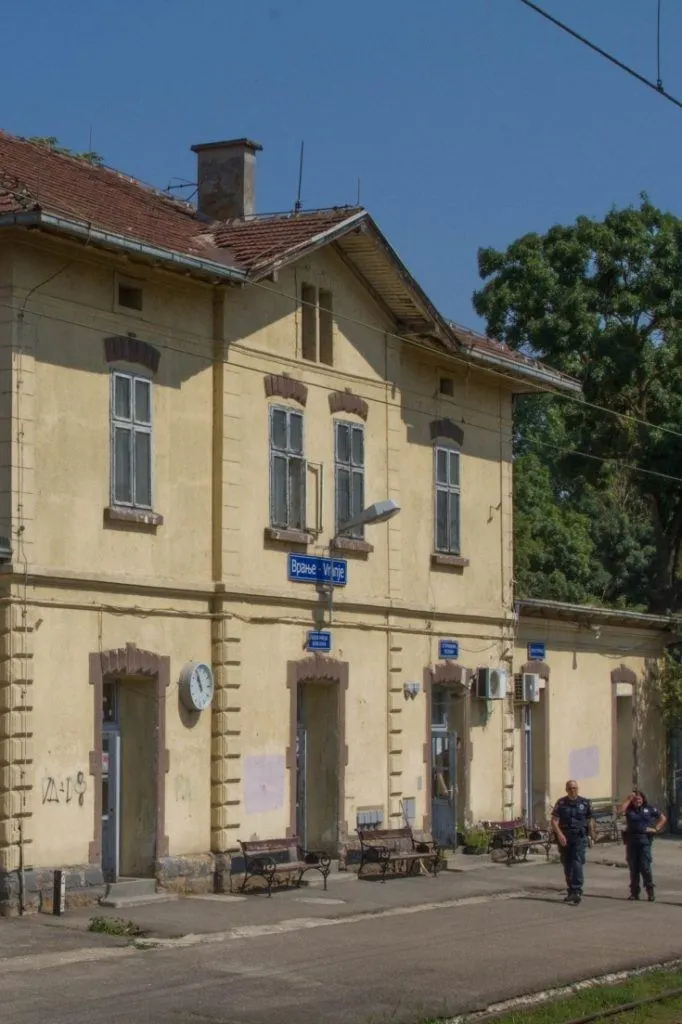 Two customs officials getting ready to board our train to stamp passports.