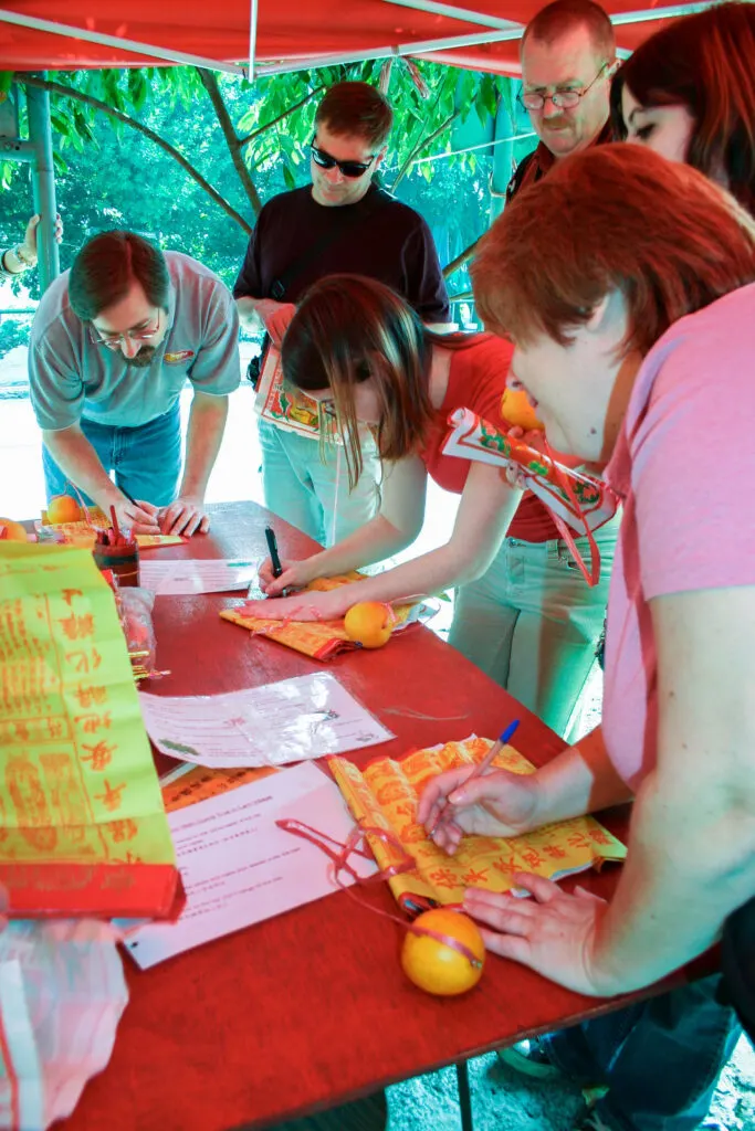 Writing our wishes for the wishing tree.